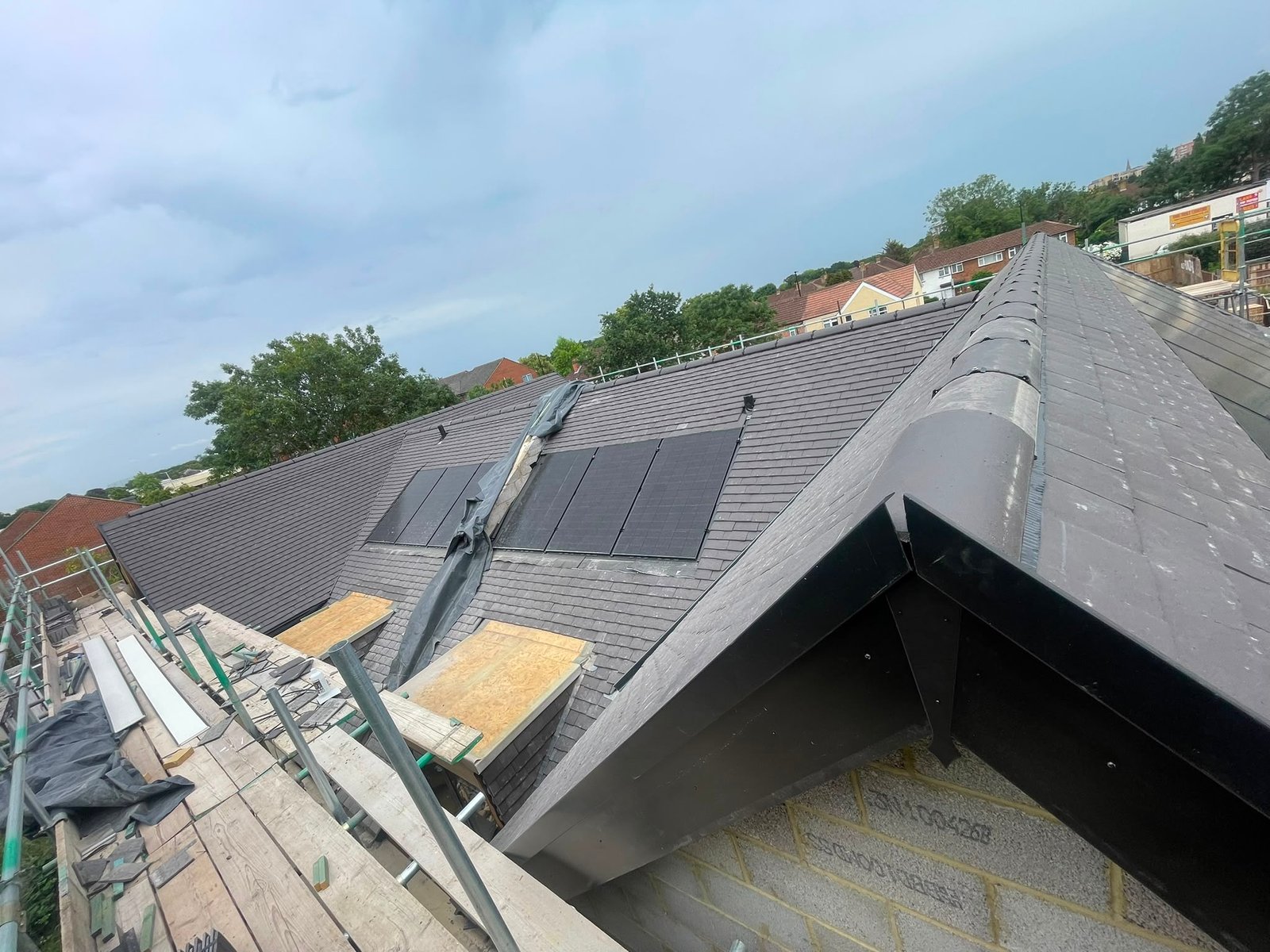 Completed Pitched Roof with Solar Panels by B KARAN BUILD ROOFING Ltd